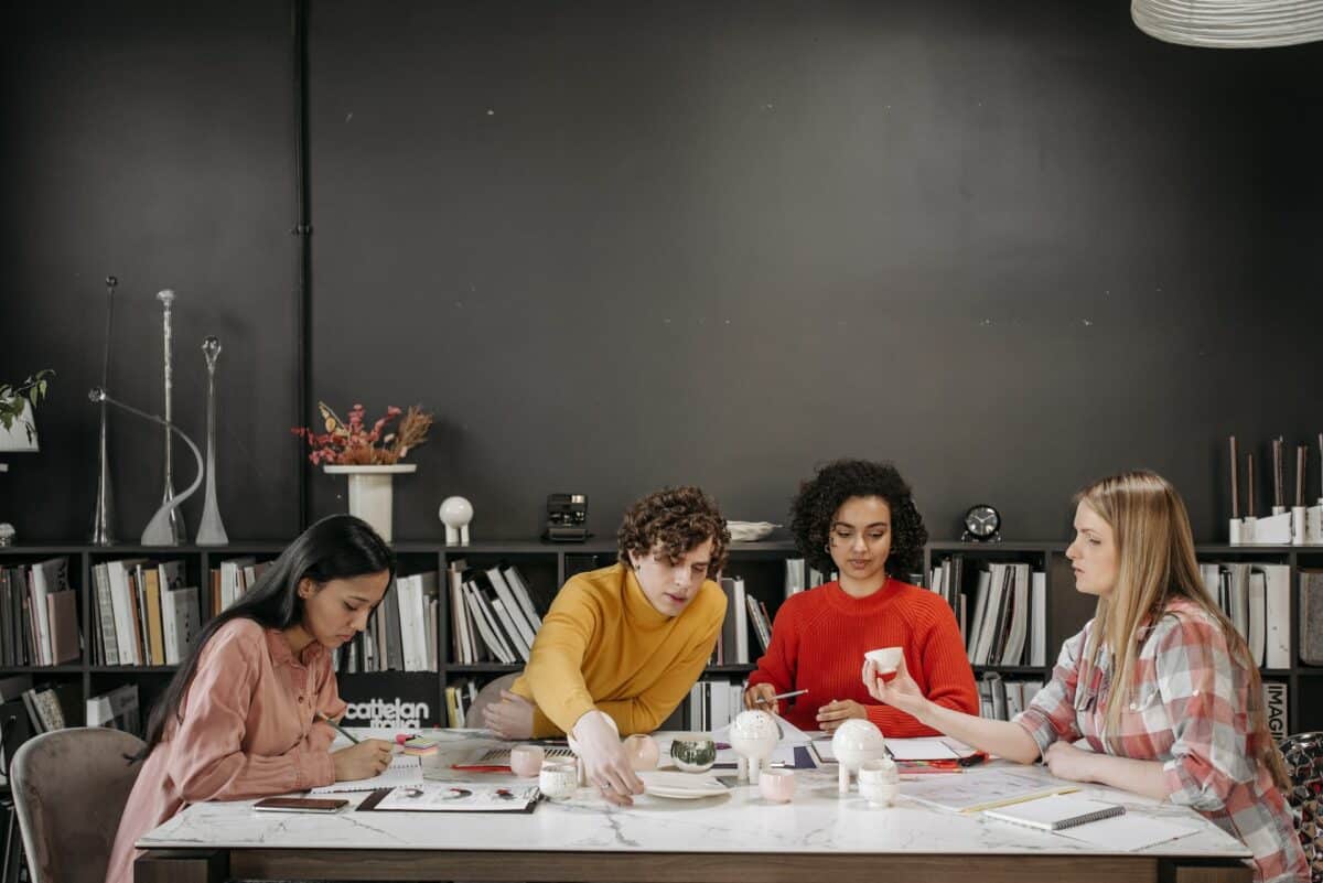 a team sitting at a table
