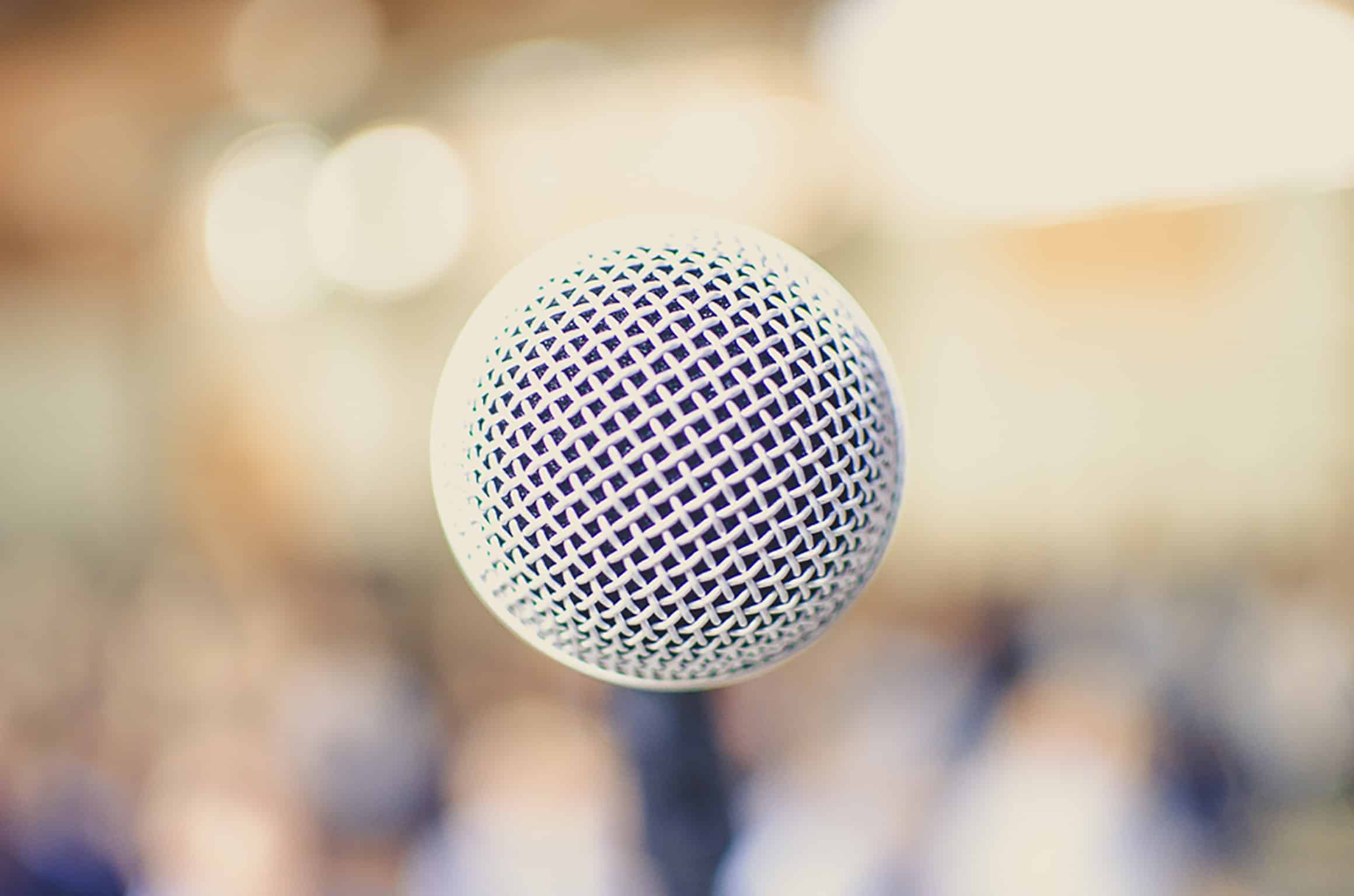A microphone pointing right at the viewer